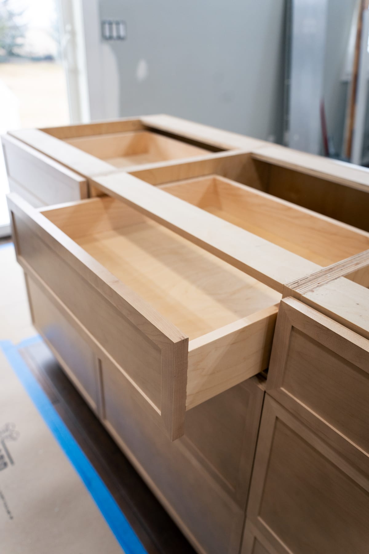 Maple Grove — custom maple cabinetry under construction on site