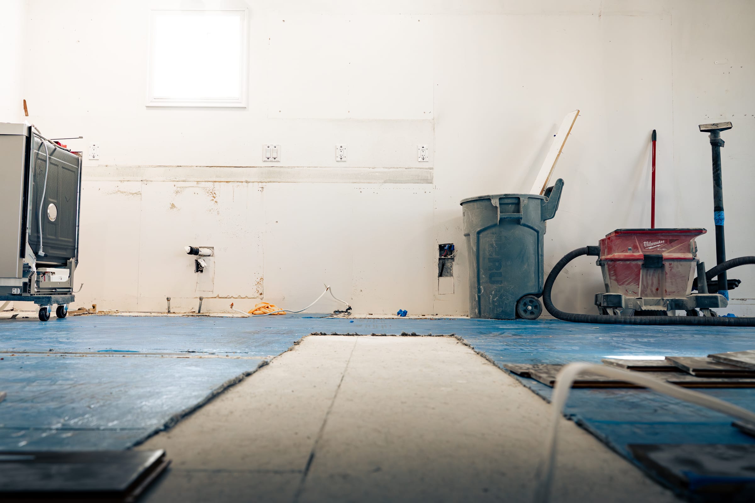 Maple Grove — kitchen stripped to the rough-ins during demolition